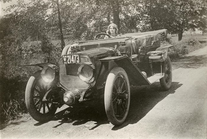 florence in a lozier open touring car